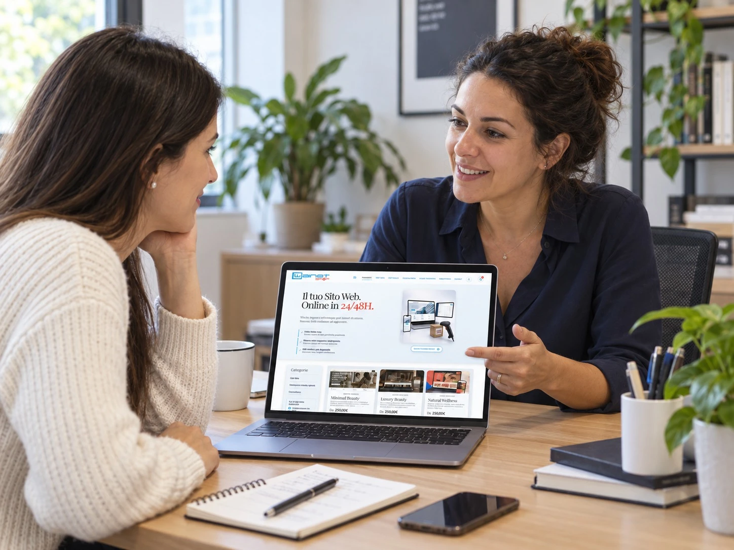 Scena illustrativa di consulenza: due persone consultano WAINET Shop sul portatile